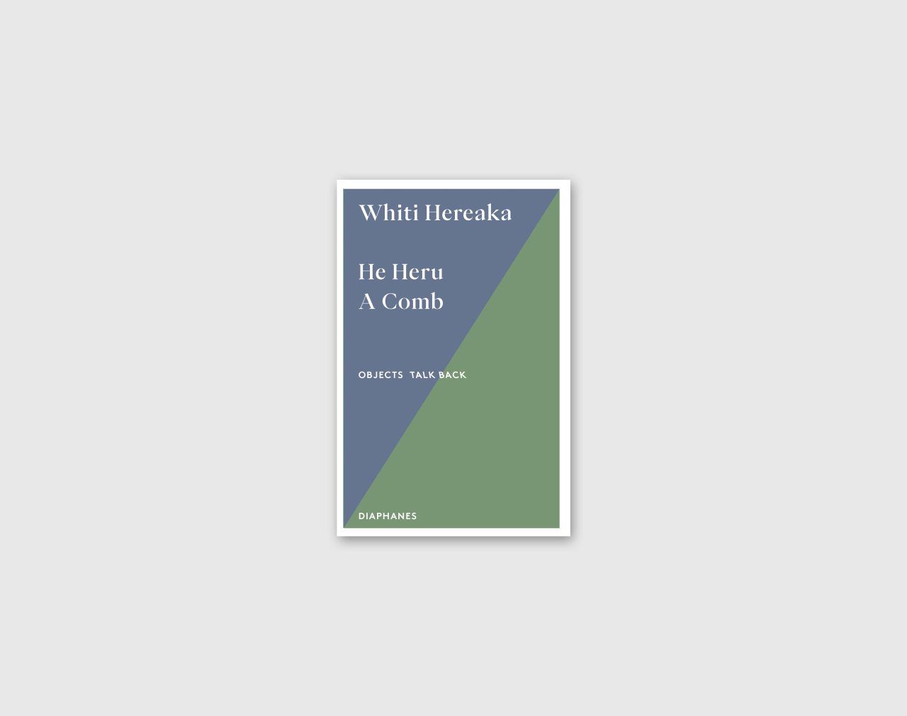 Book cover titled "He Heru A Comb" by Whiti Hereaka, featuring geometric design in blue and green colors.